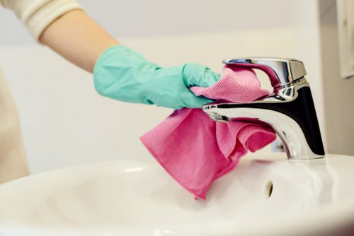 Carpet cleaning technician preparing equipment for a service booking
