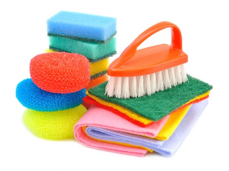 Cleaner using equipment carefully during carpet cleaning service